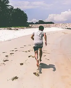 Runner on a tropical beach